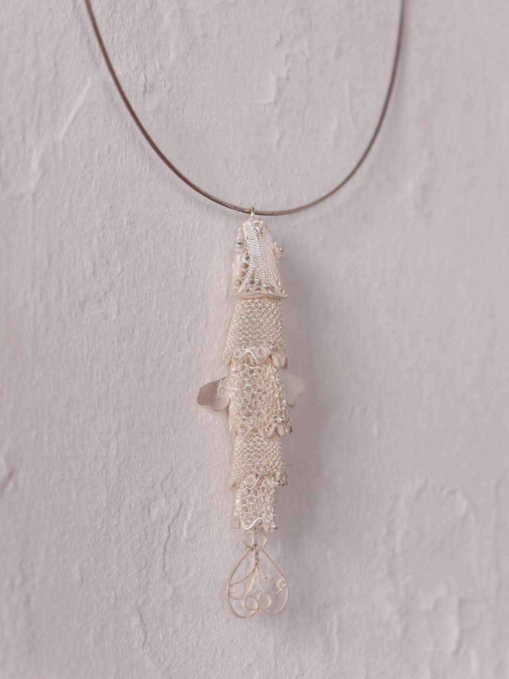 Photo of a fish charm (jewelry)